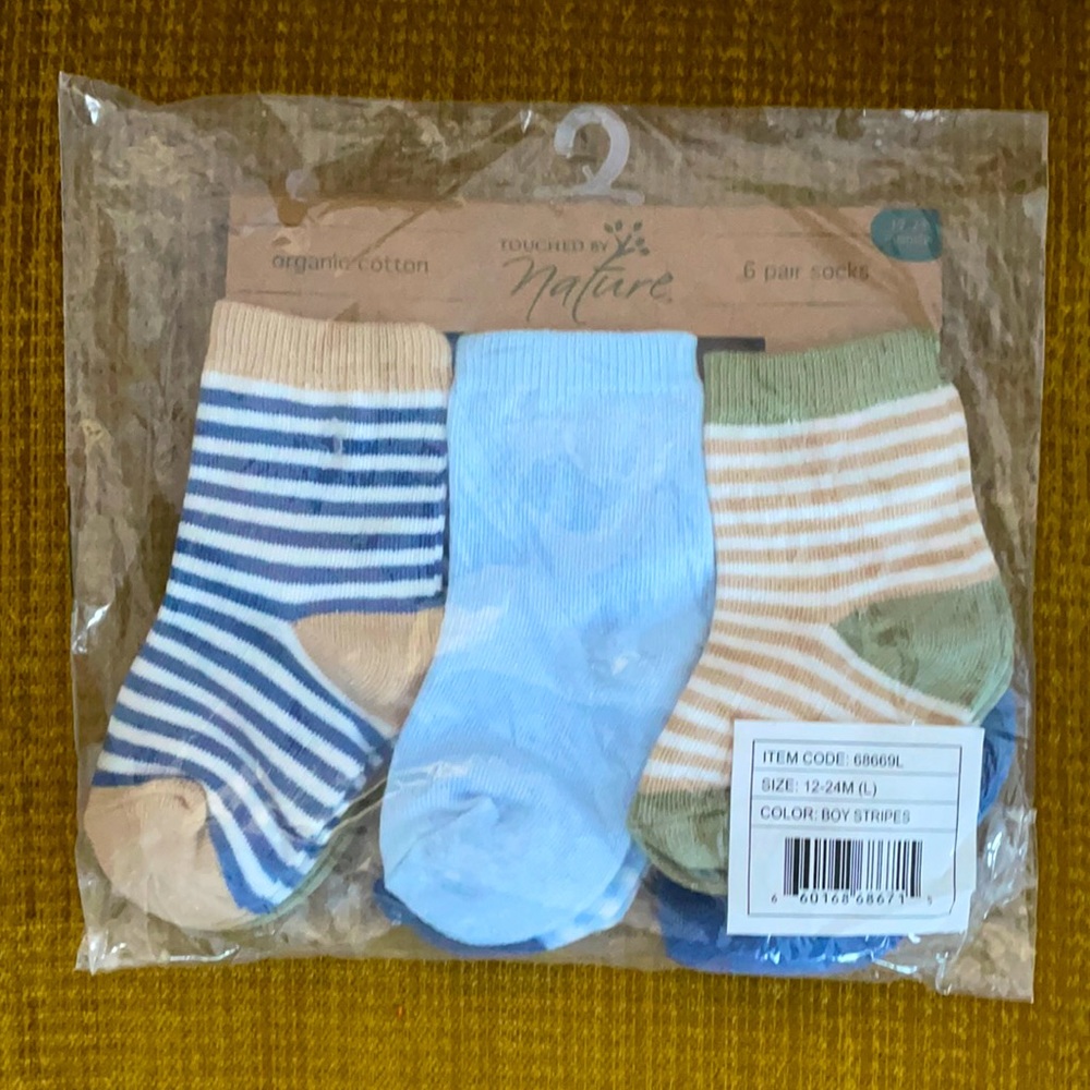 6 pack of Touched by Nature Socks, size 6-12 and 12-24 months
